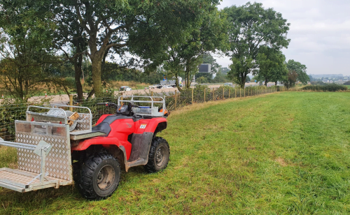 Quad bike equipment supporting the laying of stock fencing along the smart motorway